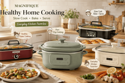 A marketing collection of four Magnifique slow cookers in different colors (matte black, mint green, off-white, and deep red) arranged on a light-colored wooden kitchen counter with open shelves in the background. The main text header reads "MAGNIFIQUE Healthy Home Cooking Slow Cook • Bake • Serve". Each pot has a cartoon chef illustration and text overlay: "Healthy Home Cooking", "Pure Clay Cooking", "Slow Cook Bake • Serve", and "Everyday Kitchen Favorites". Prepared dishes include a plate of beef and vegetable stew, a dish of cinnamon rolls, and various fresh ingredients like vegetables, tomatoes, and mushrooms.