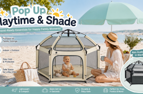 The California Beach Company Pop ’N Go playpen in warm ivory at a sunny beach, paired with a mint shade umbrella, baby and parent, highlighting portable, indoor-outdoor family use.