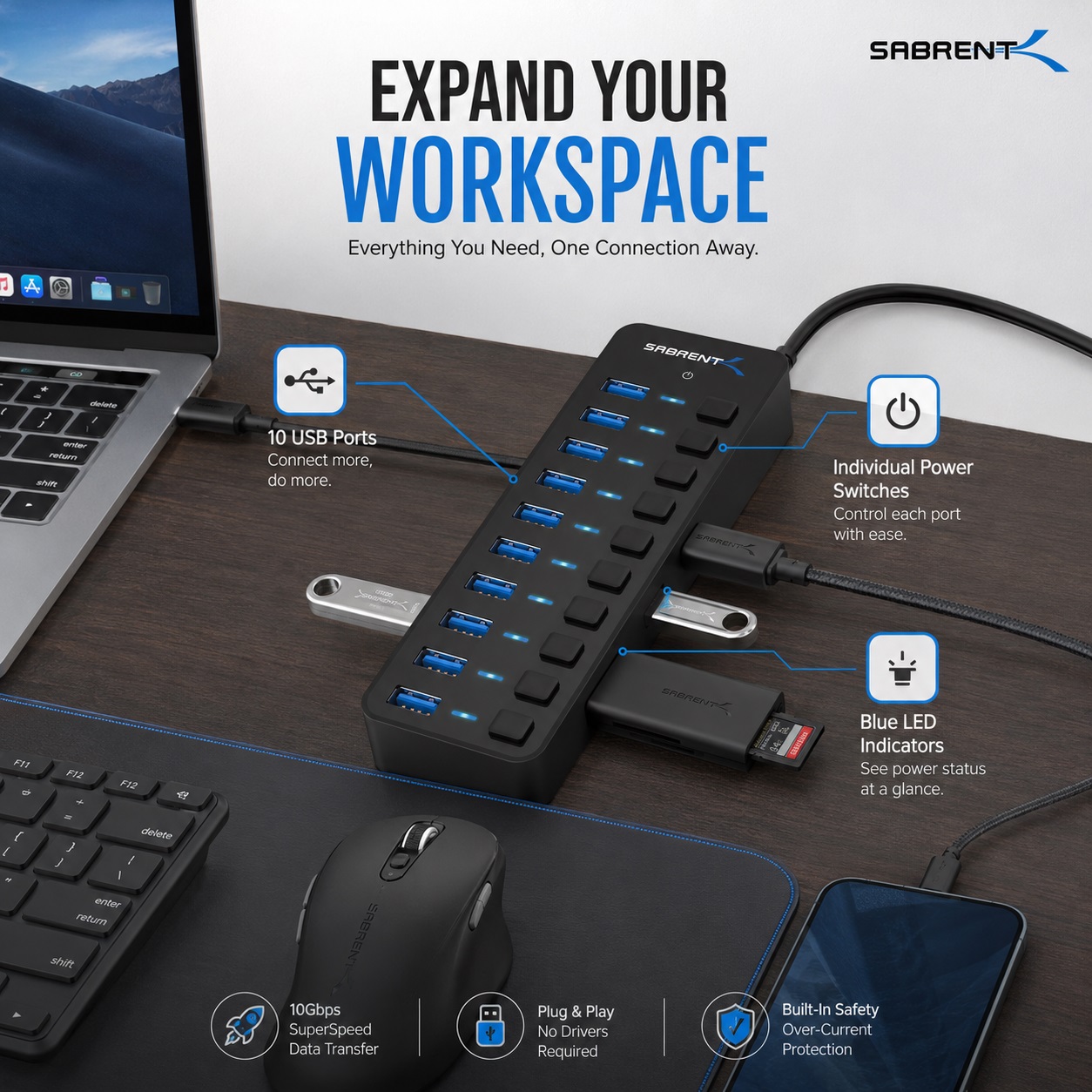 SABRENT 10-port USB hub connected to a computer workspace, featuring multiple USB ports, individual power switches, blue LED indicators, and expanded device connectivity.