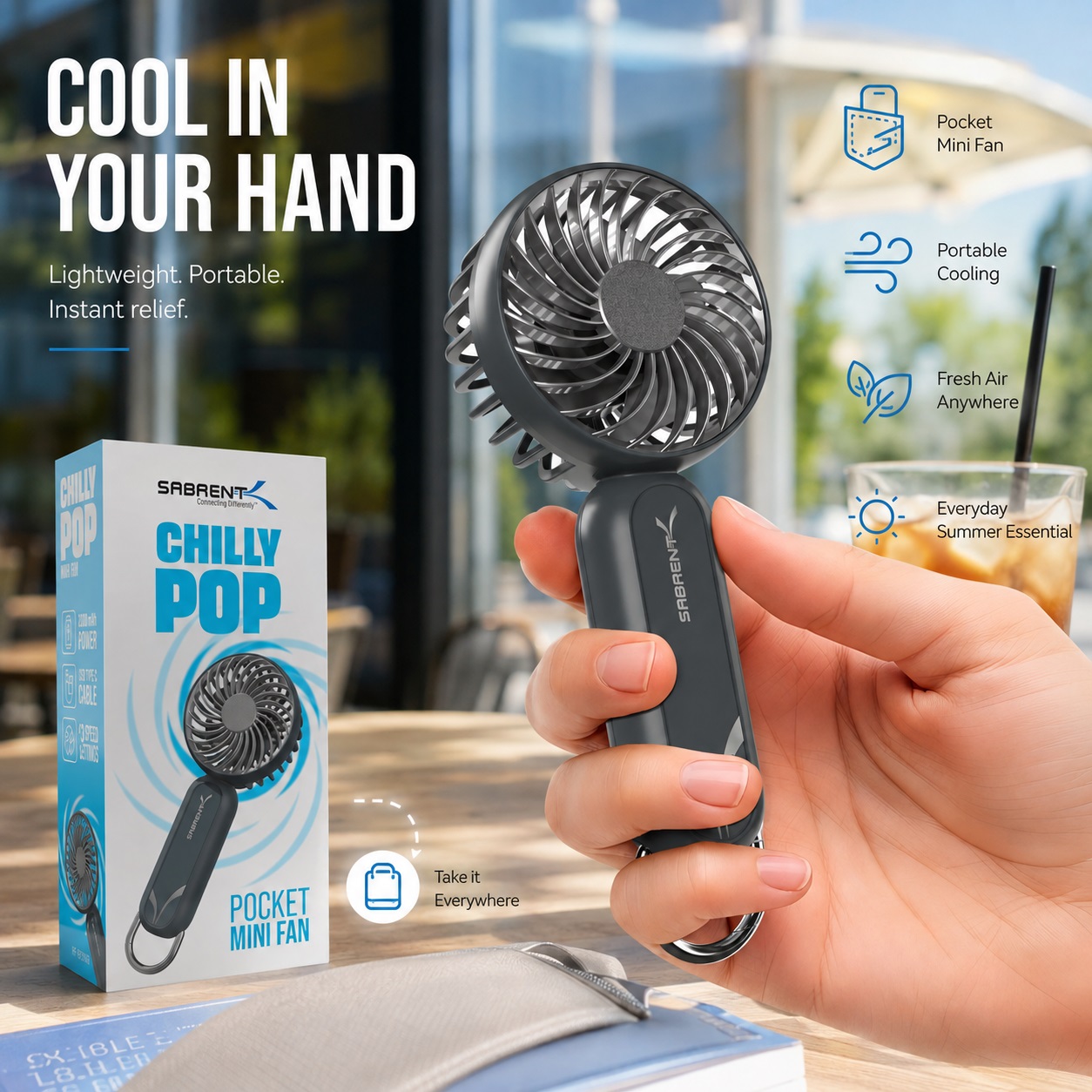 SABRENT Chilly Pop portable mini fan held in hand with retail packaging, highlighting compact design, personal cooling, and convenient everyday outdoor use.