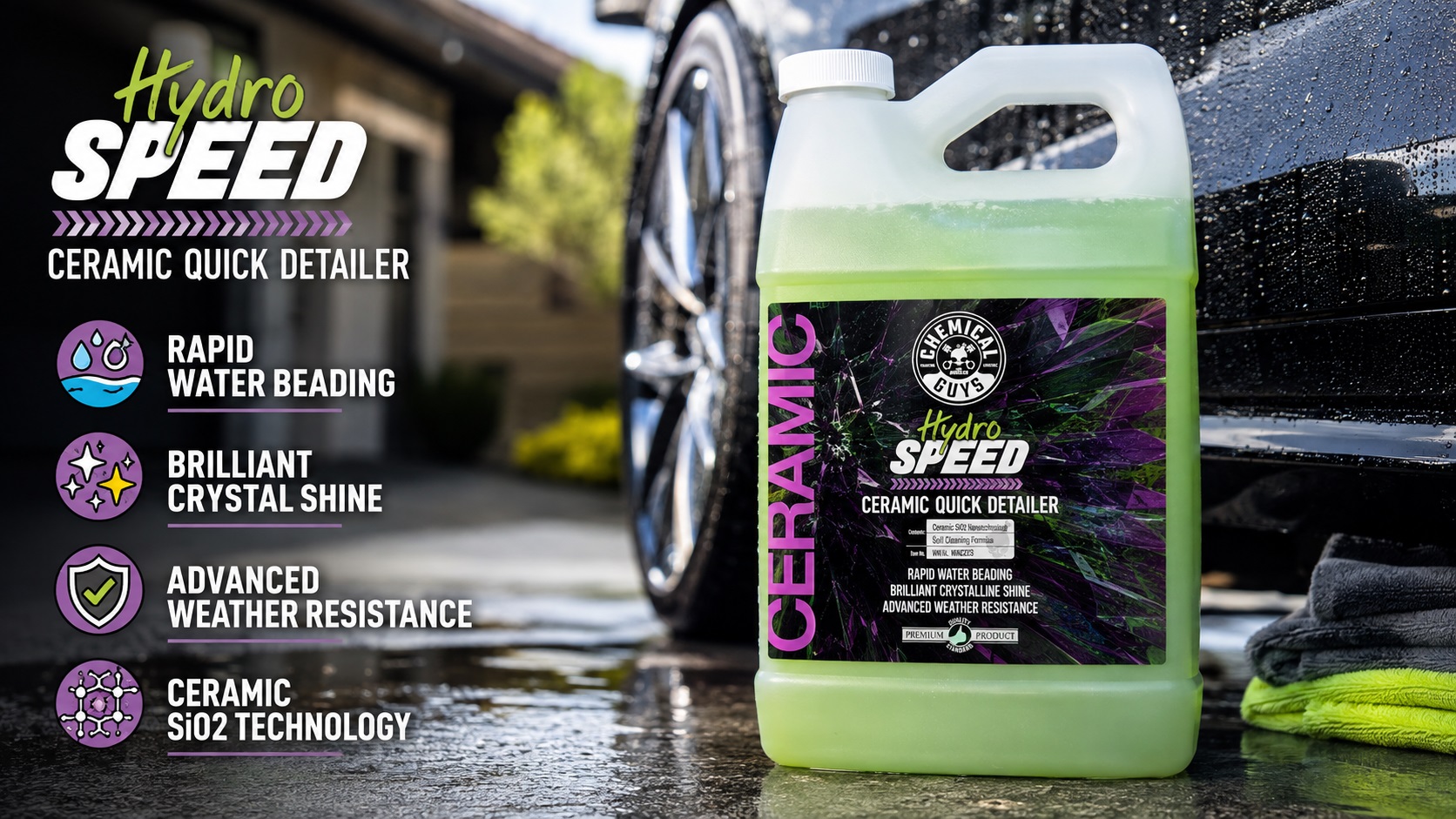A large, clear one-gallon jug of Chemical Guys HydroSpeed Ceramic Quick Detailer with light green liquid, sitting on a wet concrete surface with a blurred residential house and car wheel in the background. Feature icons and descriptions are on the left.