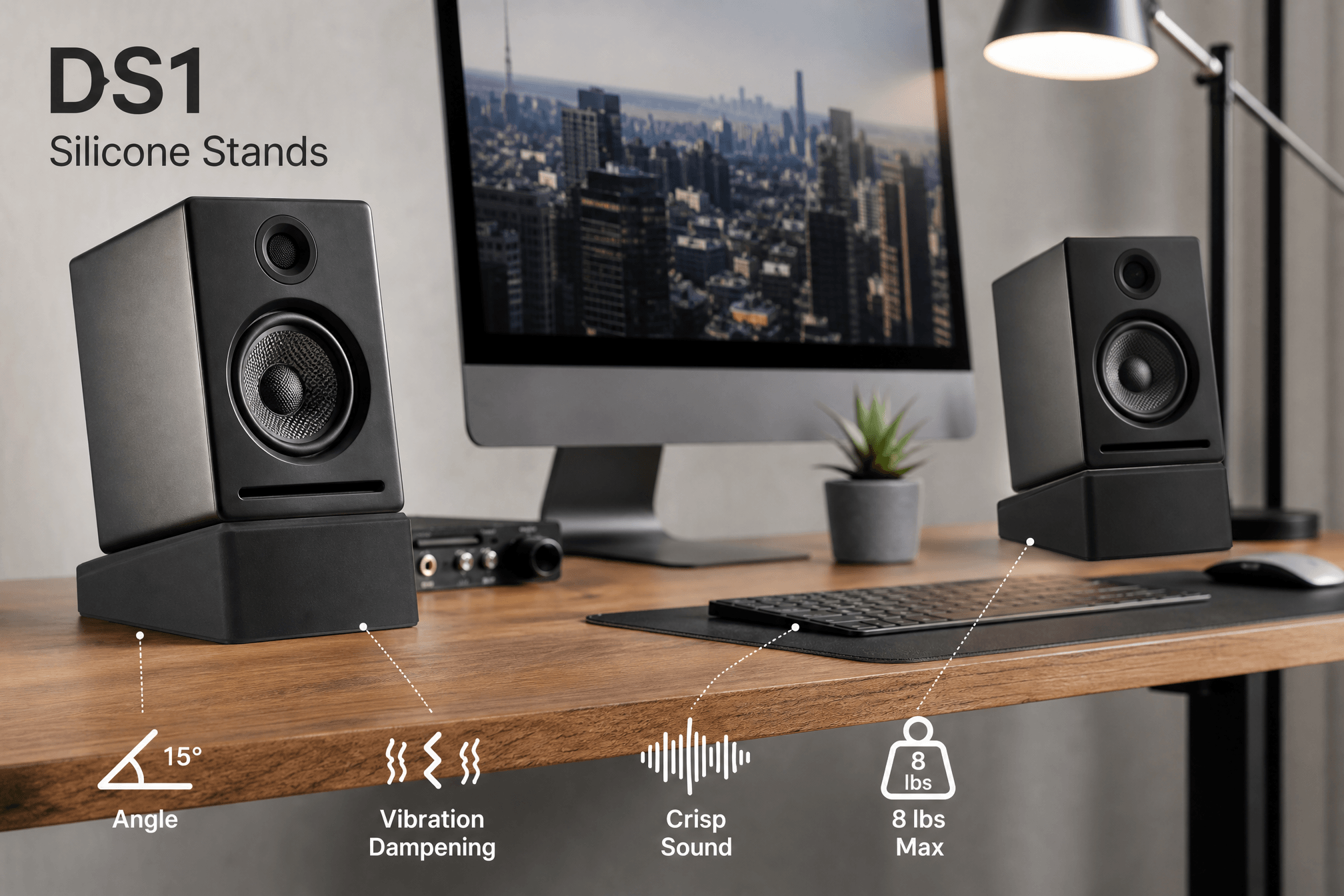 An infographic of Audioengine DS1 Silicone Stands holding black speakers on a desk, with icons detailing features like 15° angle, vibration dampening, crisp sound, and an 8 lbs max weight limit.