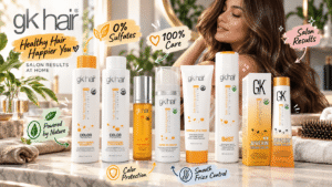 GK Hair product collection displayed on a bright salon vanity with a woman showing glossy brown hair. The image highlights salon results at home, sulfate-free care, color protection, frizz control, and nature-inspired hair care.
