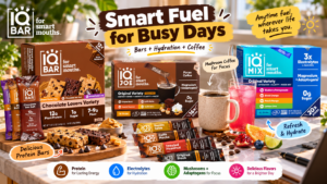 IQBAR lifestyle hero featuring IQBAR protein bars, IQJOE mushroom coffee, and IQMIX electrolyte drink mix on a bright kitchen workspace, with coffee, a pink hydration drink, snacks, fruit, and colorful callouts highlighting protein, hydration, and focus support.