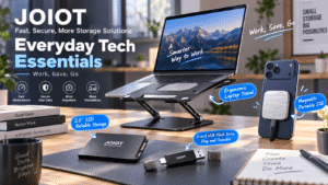 JOIOT tech essentials displayed in a modern workspace, featuring an adjustable laptop stand, 2.5-inch SSD, dual-interface USB flash drive, and magnetic portable SSD attached to a phone. English callouts such as “Everyday Tech Essentials” and “Work, Save, Go” highlight portable storage and everyday productivity.