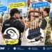 SAMCOM two-way radio brand blog hero image showcasing a transparent acoustic tube earpiece, shoulder speaker microphone, six-way charger, and six-pack radios in real-life scenarios such as construction sites, security patrols, warehouses, and outdoor team activities, with English selling-point annotations and cartoon markers.