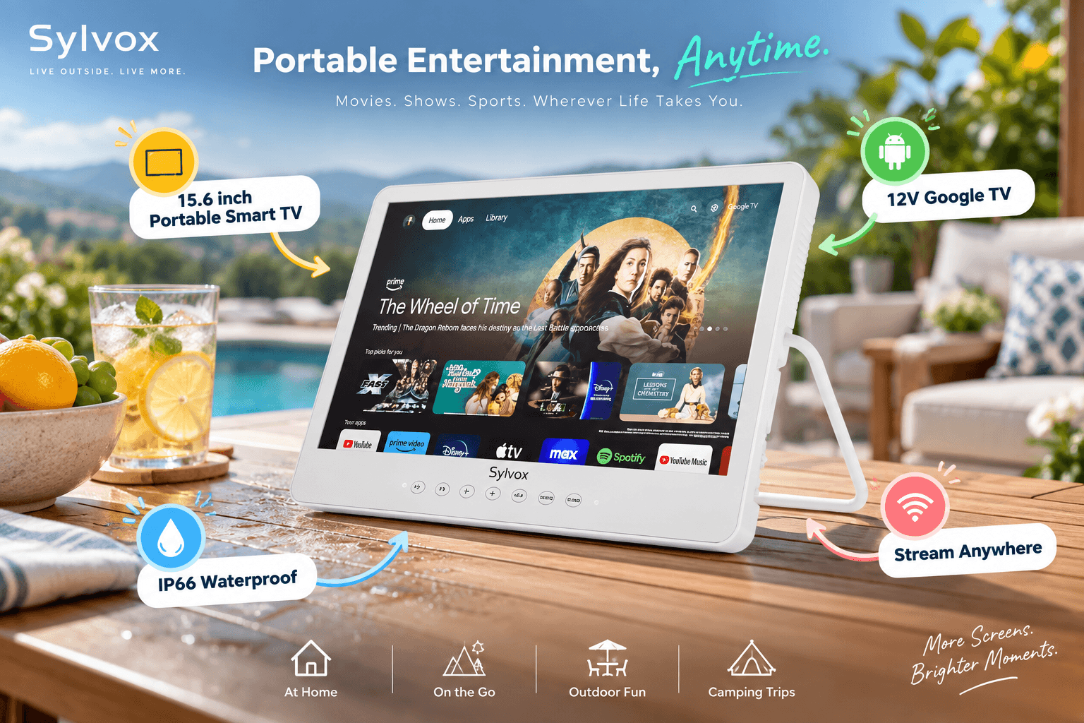 White SYLVOX 15.6-inch portable smart TV with kickstand on a sunny outdoor table, featuring 12V Google TV, IP66 waterproof protection, and flexible streaming for home or travel.