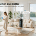 Promotional blog hero image of Hiswelle smart tower humidifiers staged in a bright Scandinavian living room with floor-to-ceiling windows, a young woman holding a smartphone showing the app control interface, soft mist rising from the units, cartoon-style English callouts reading "Smart App Control · 8L Capacity", "360° Dual Nozzle Mist Distribution", and "Visible Water Tank · Easy Refill", headline "Breathe Better, Live Better".