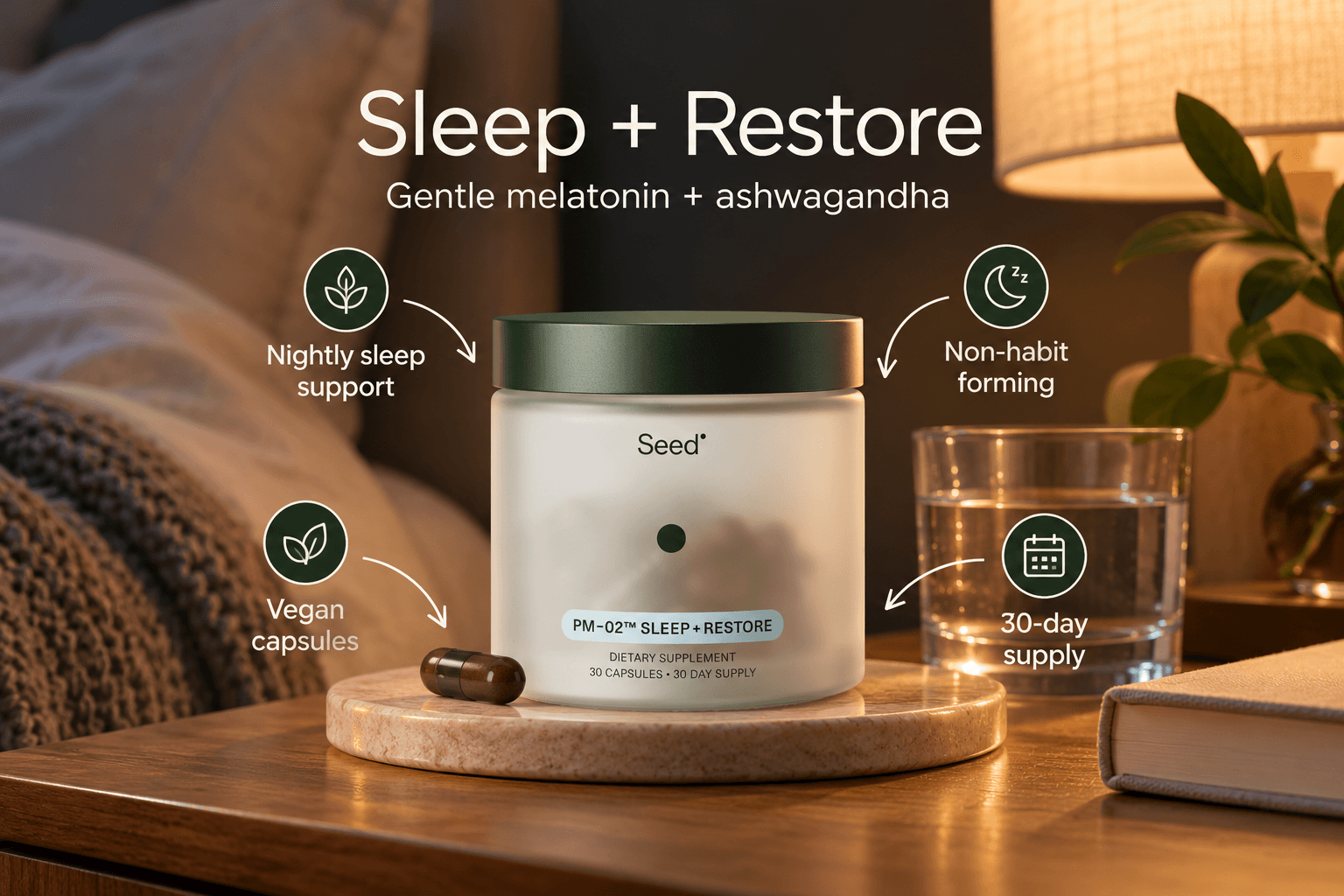 Seed PM-02 Sleep + Restore supplement in a frosted white jar on a cozy bedside table with warm lighting, a water glass, and a capsule. Illustrated callouts highlight melatonin, ashwagandha, nighttime sleep support, vegan capsules, and a 30-day supply.