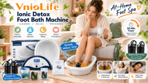 VnioLife ionic foot bath spa promotional banner featuring a woman enjoying a relaxing at-home foot soak, a white foot basin, digital controller, replacement arrays, Epsom salt, and wellness-themed graphic annotations.