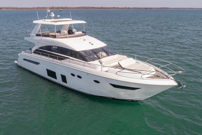 2016 Princess 68 luxury yacht cruising on the water.