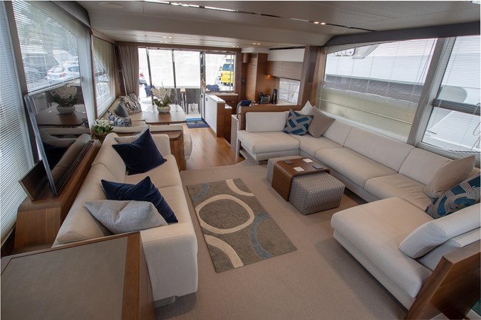 2016 Princess 68 luxury yacht cruising on the water.