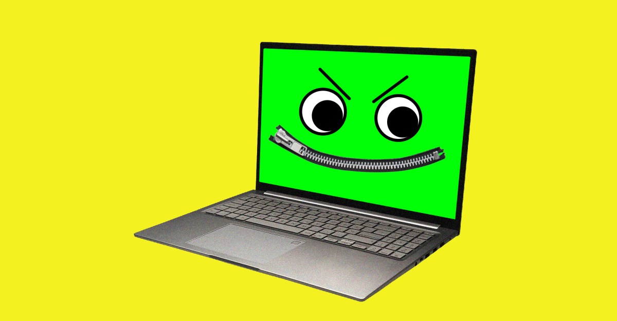 A laptop with a green malicious smiley face on its screen, the mouth a zipper.