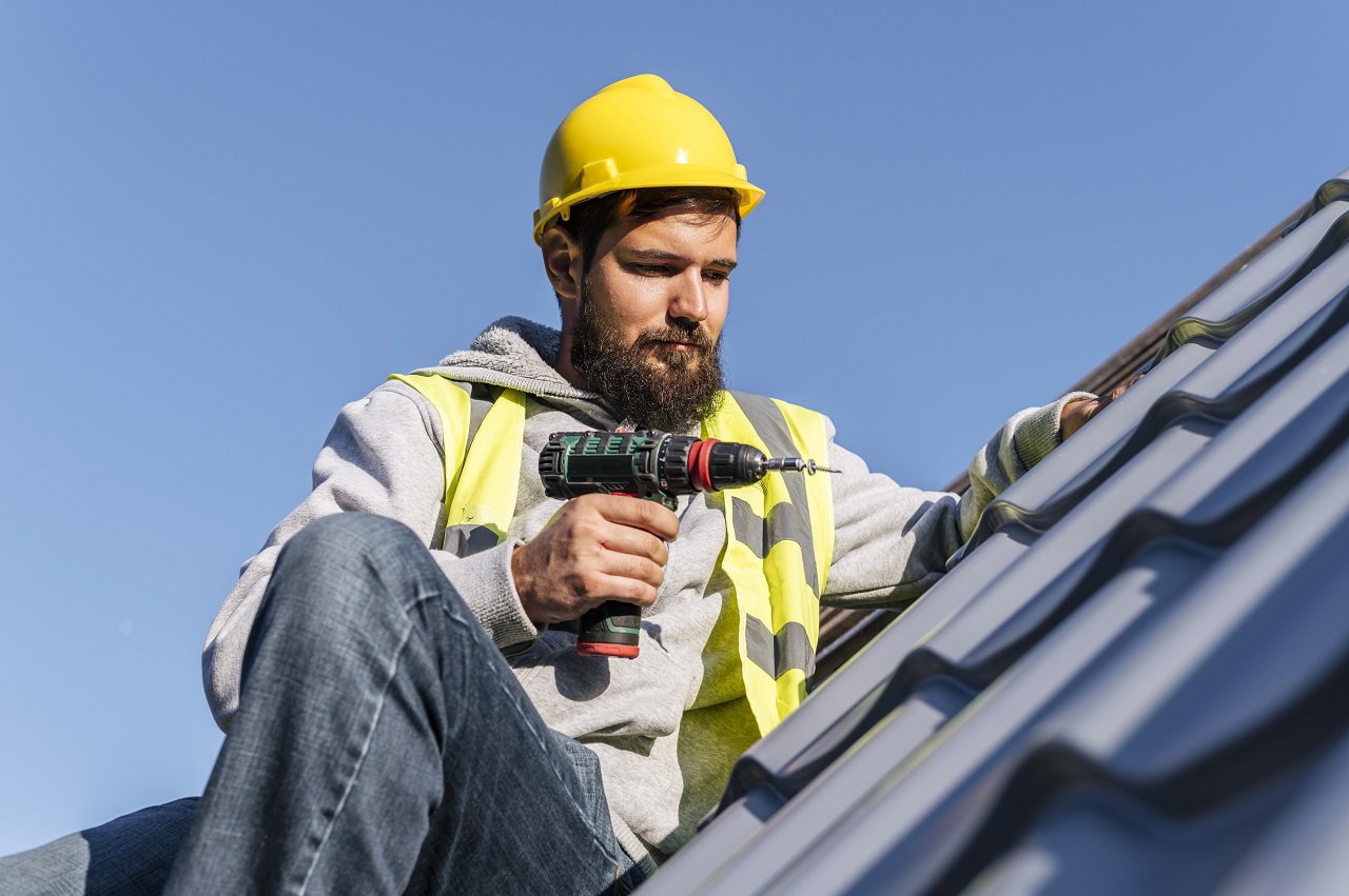 Man working roof front view