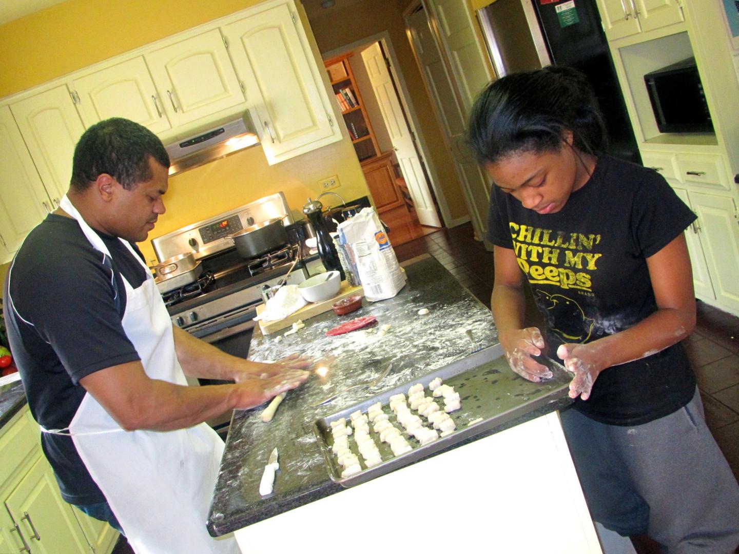 Chef Mychael and his daughter cooking