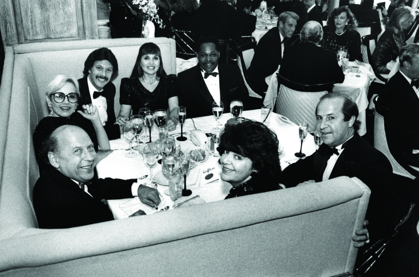 Richard and Martha Melman in Booth One at The Pump Room with baseball infielder Dave Nelson, Jane and Bernie Sahlins, Joyce Sloan and Danny Coval.