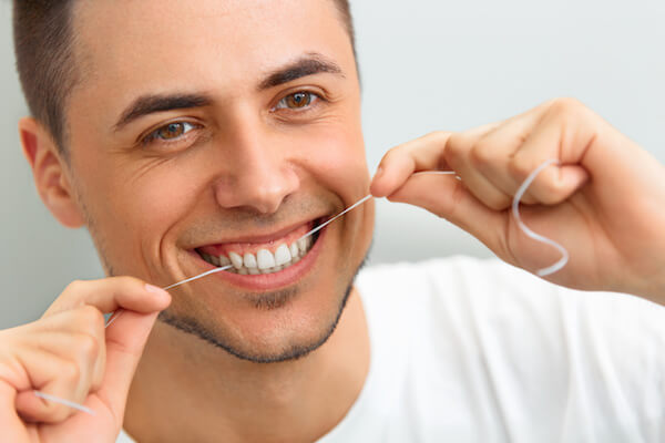 floss with lingual braces