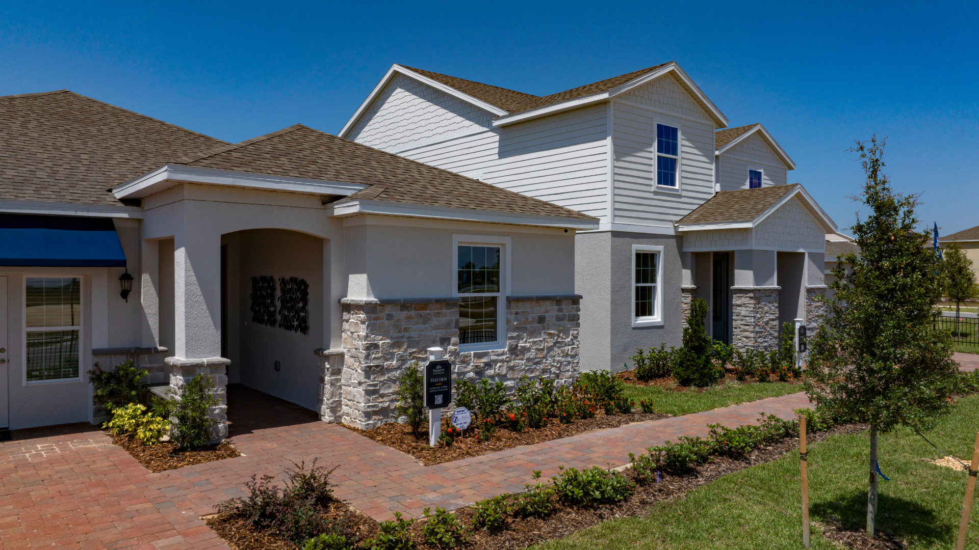 Modern multigenerational home design by Trinity Family Builders featuring flexible floor plans, private in-law suites, and spacious open-concept living areas in new construction homes across Central Florida.