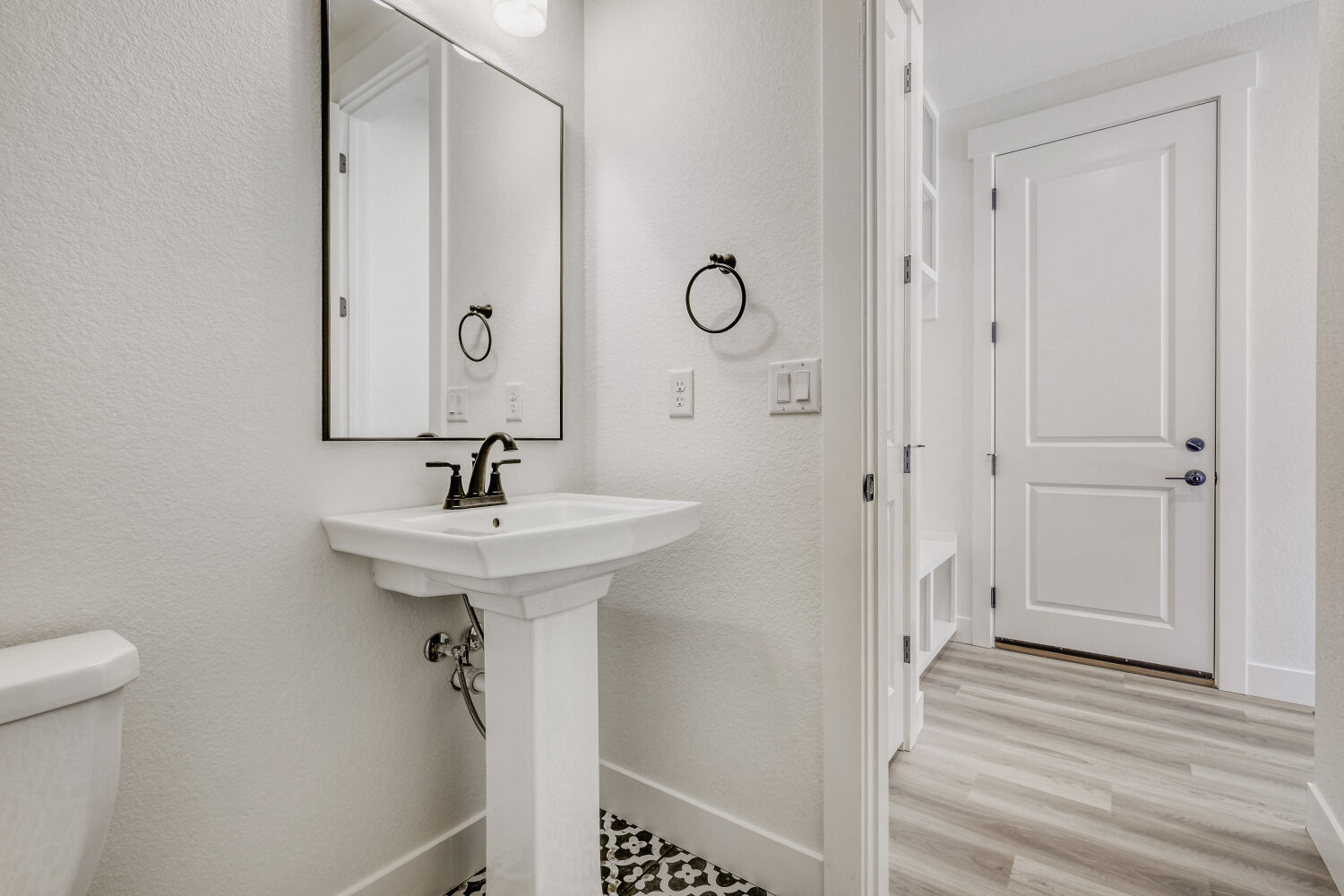 8734 San Diego - Powder Bathroom. 5br New Home in Colorado Springs, CO