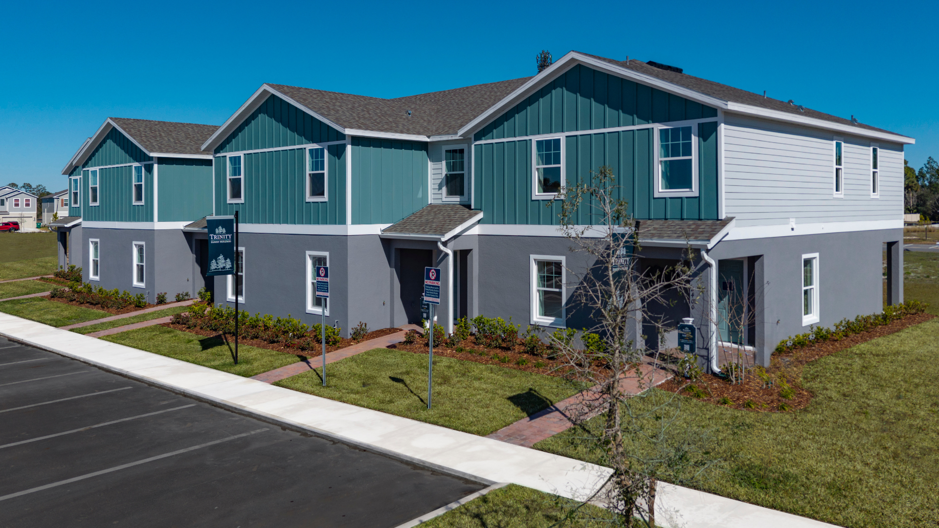 New construction townhome exterior at Pine Meadows Reserve in Eustis Florida – apartment vs townhome comparison 2026