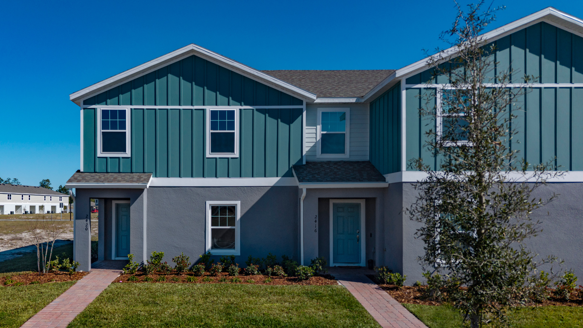 New construction townhomes at Pine Meadows Reserve in Eustis Florida by Trinity Family Builders