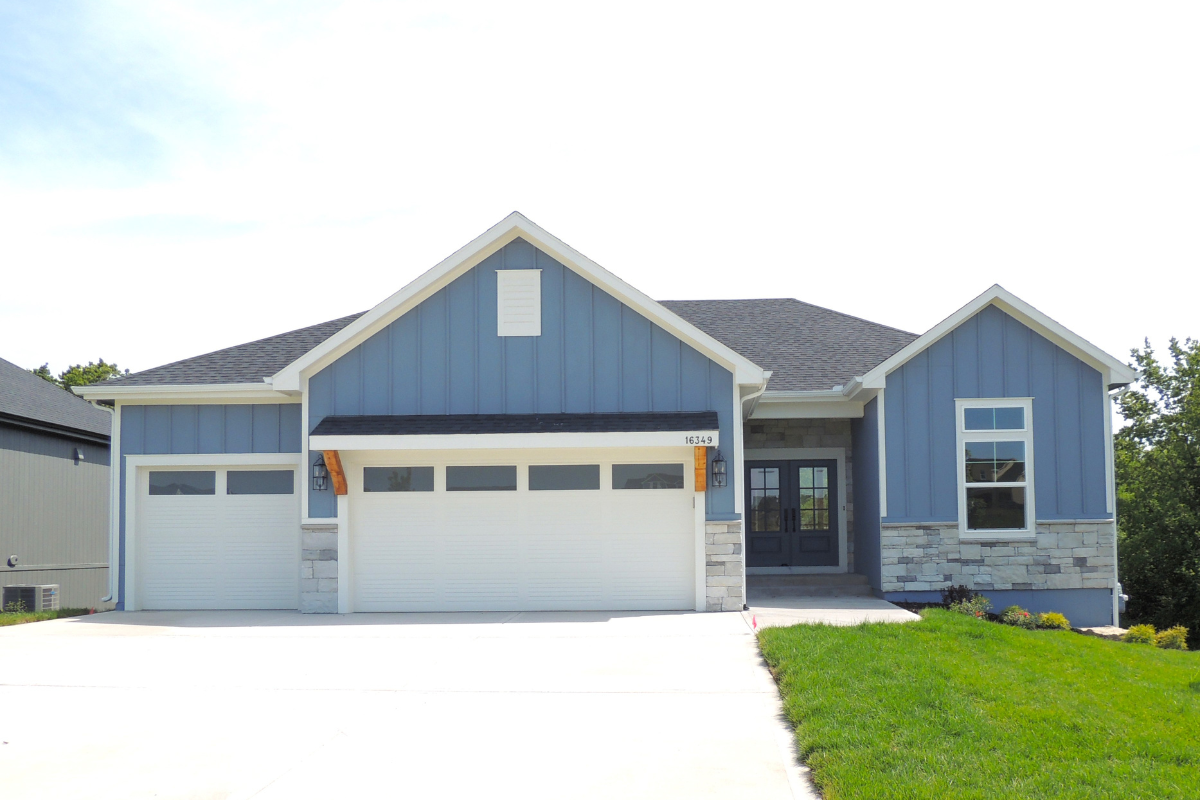 Exterior Symphony Farms home. Blue exterior.