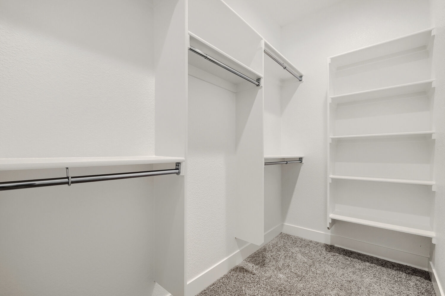 8688 Long Beach - Primary Closet. New Home in Colorado Springs, CO
