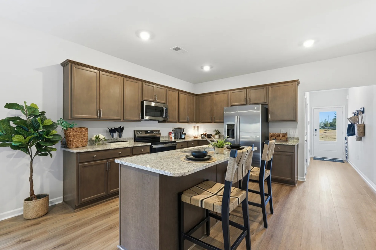 A kitchen in a Howard floor plan home.