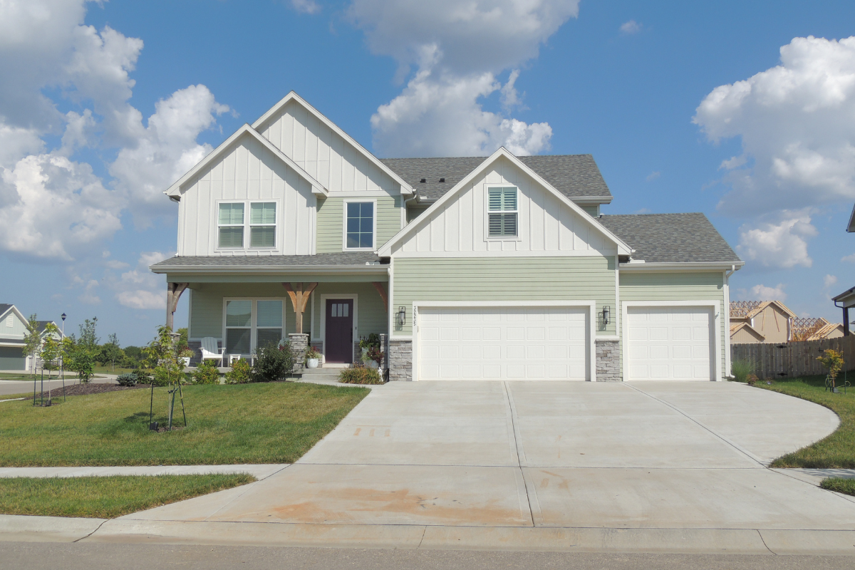Exterior of a Symphony Farms two story home. Sage exterior.