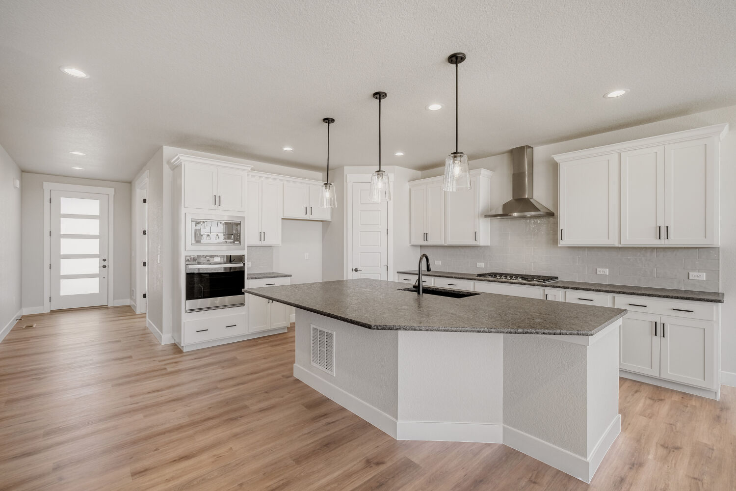 8702 Long Beach - Kitchen. 5br New Home in Colorado Springs, CO