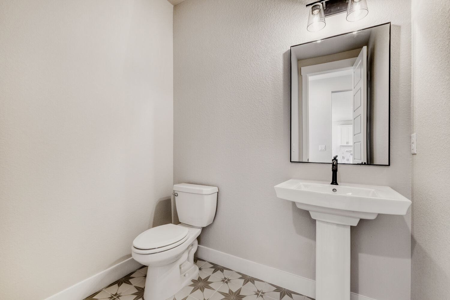 8702 Long Beach - Powder Bathroom. New Home in Colorado Springs, CO