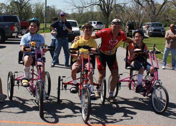 founder Jairo Alvarez rides bikes with children with special needs