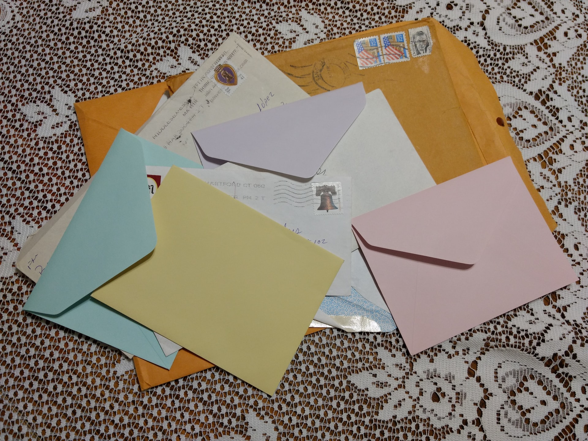 Pile of Mail Sitting on a Table