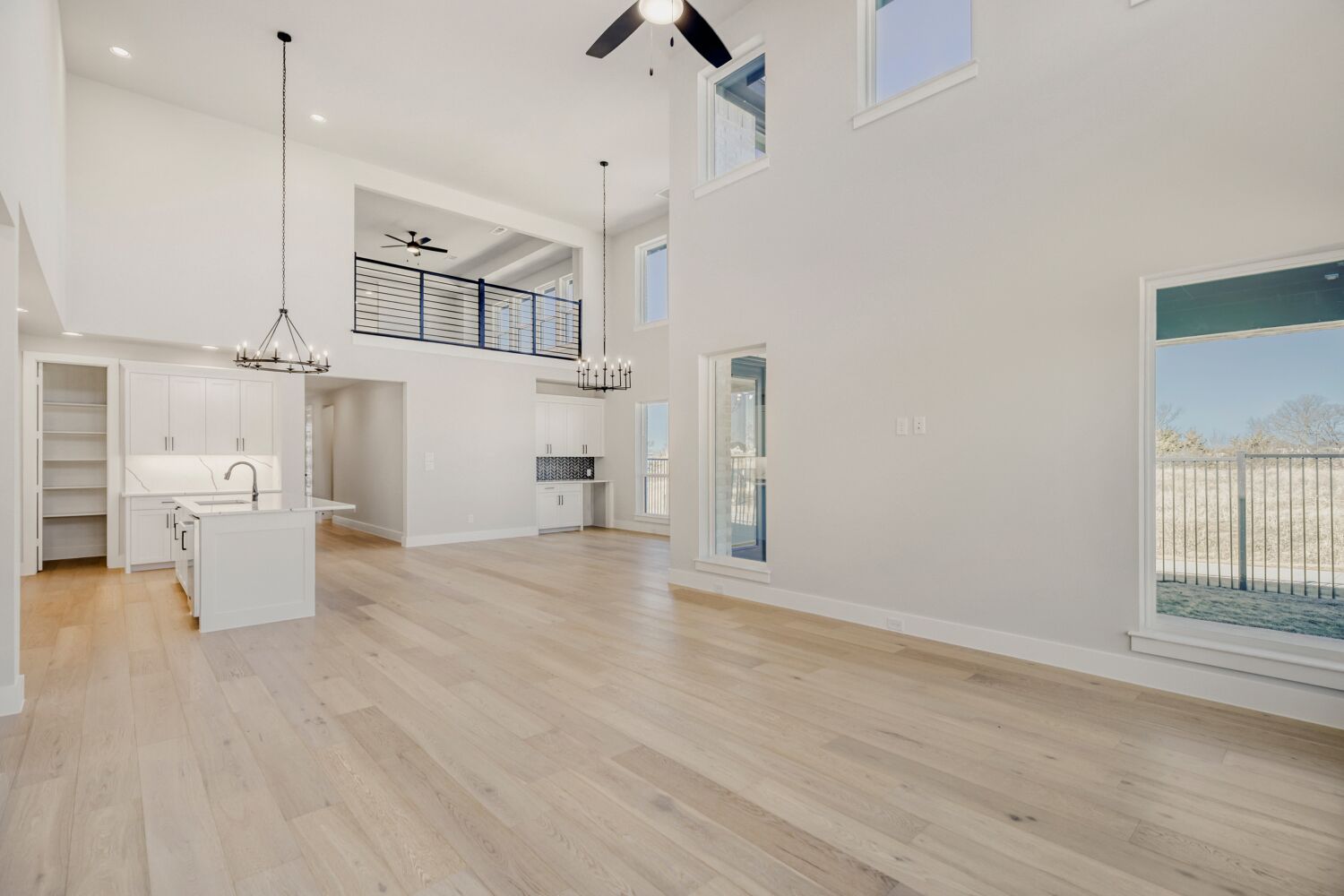 Expansive open-concept living, dining, and kitchen, complete with butler's pantry