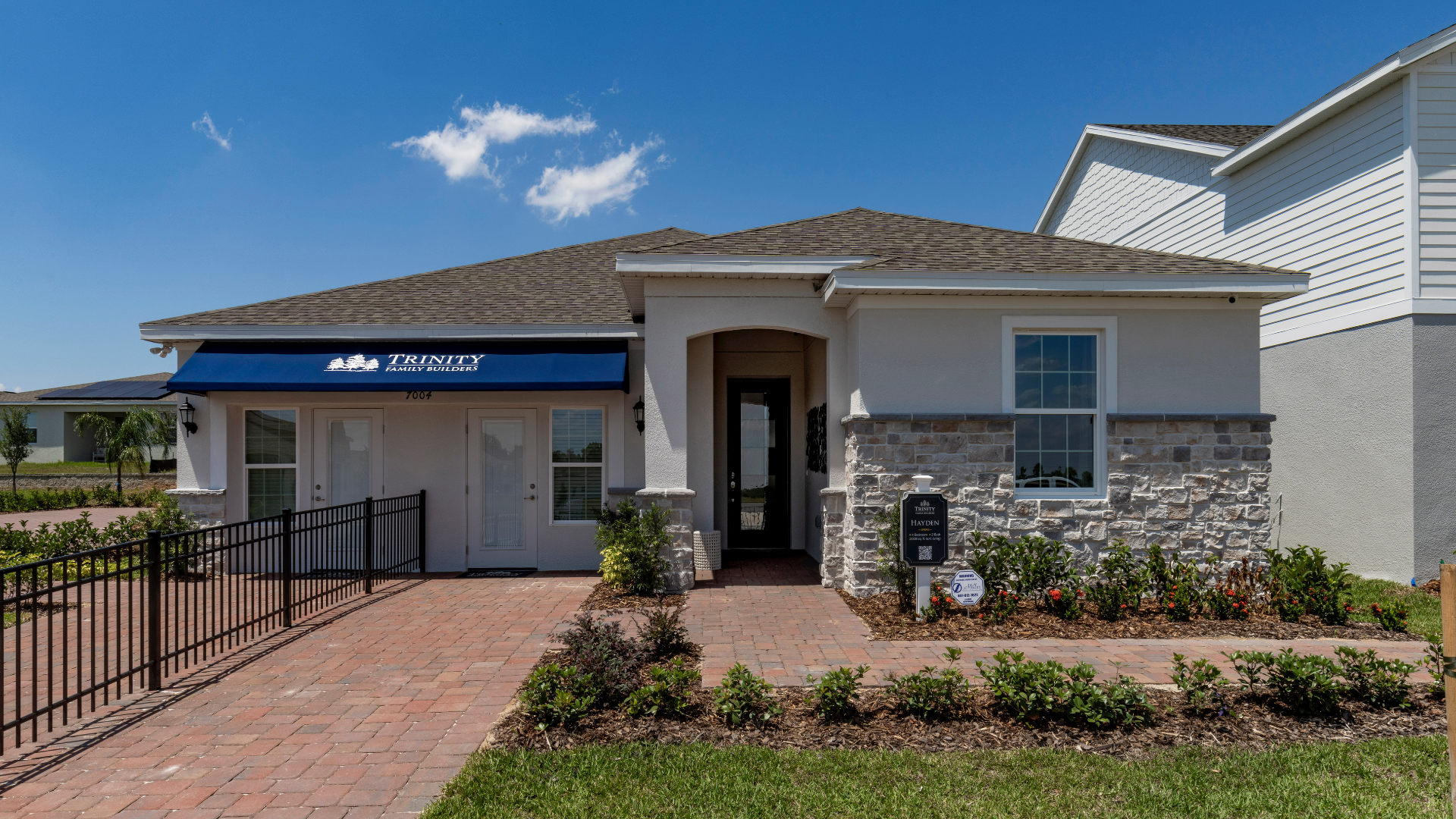Modern multigenerational home design by Trinity Family Builders featuring flexible floor plans, private in-law suites, and spacious open-concept living areas in new construction homes across Central Florida.