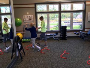 Lori training with a resident.