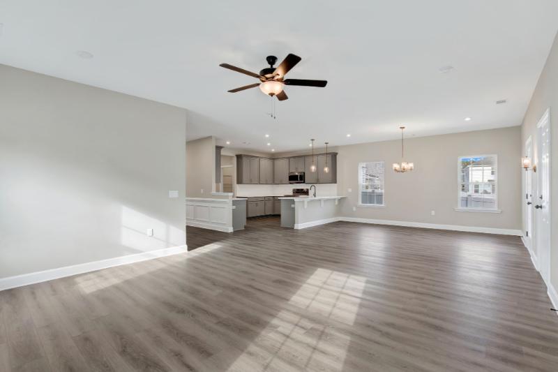 Open concept living and kitchen space at 245 James Drive in Dunham Marsh – The Villas