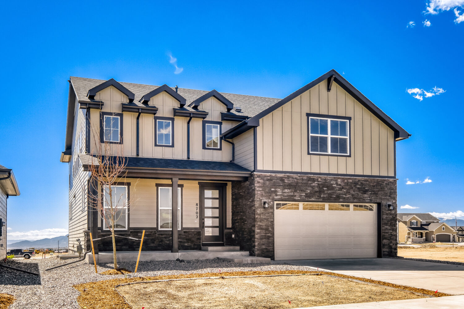 8702 Long Beach - Front Elevation. 5br New Home in Colorado Springs, CO