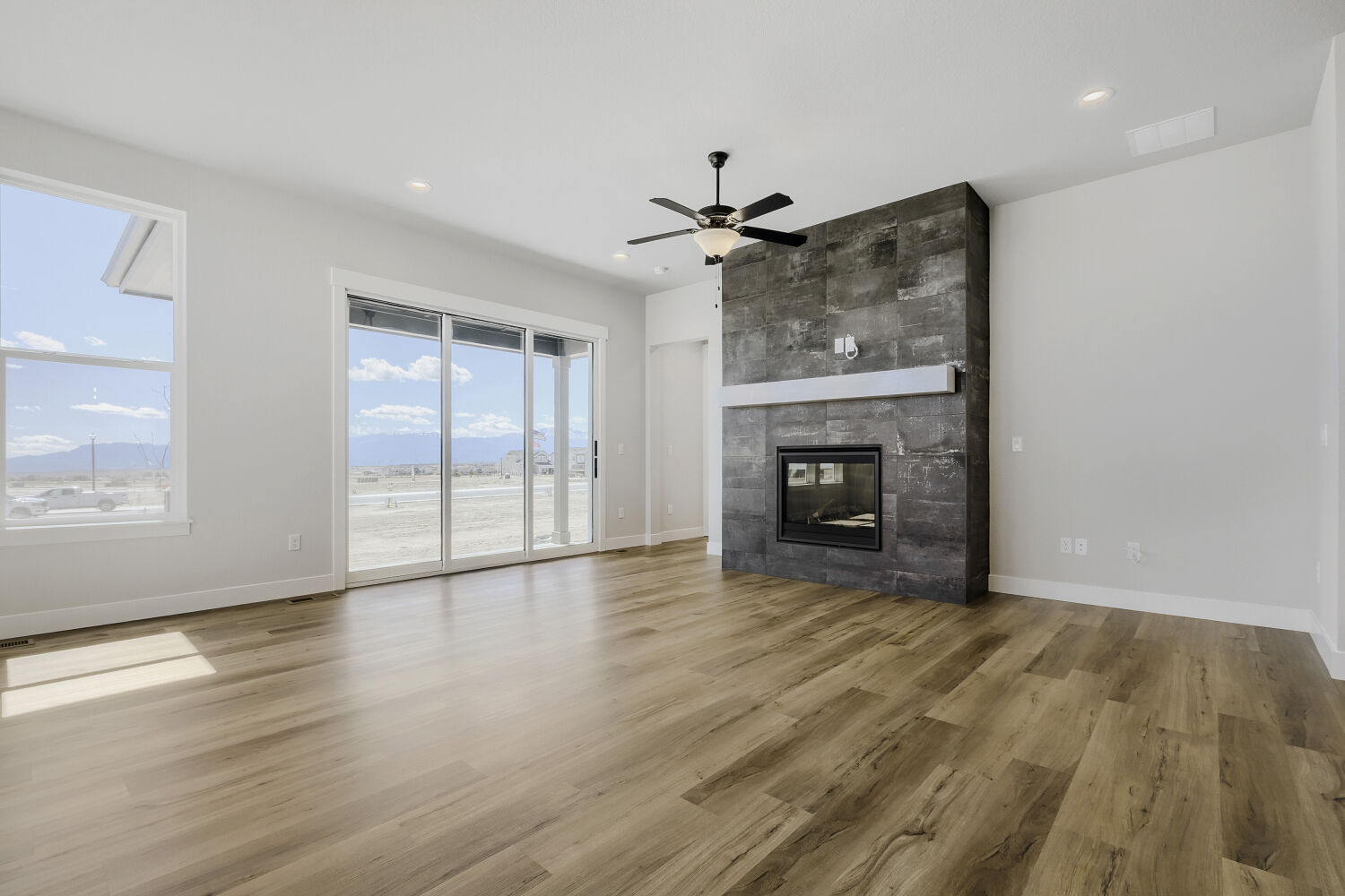 8688 Long Beach - Living Area. Colorado Springs, CO New Home