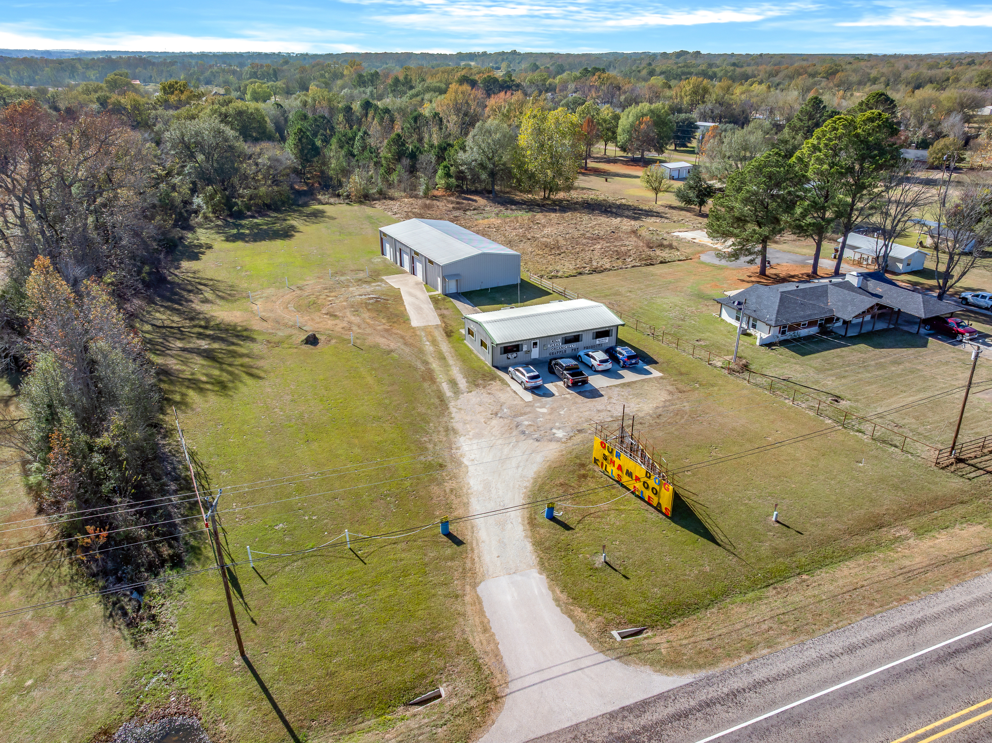 For Sale: 6 Acres + Retail Storefront + Flex Warehouse with Two Apartments
