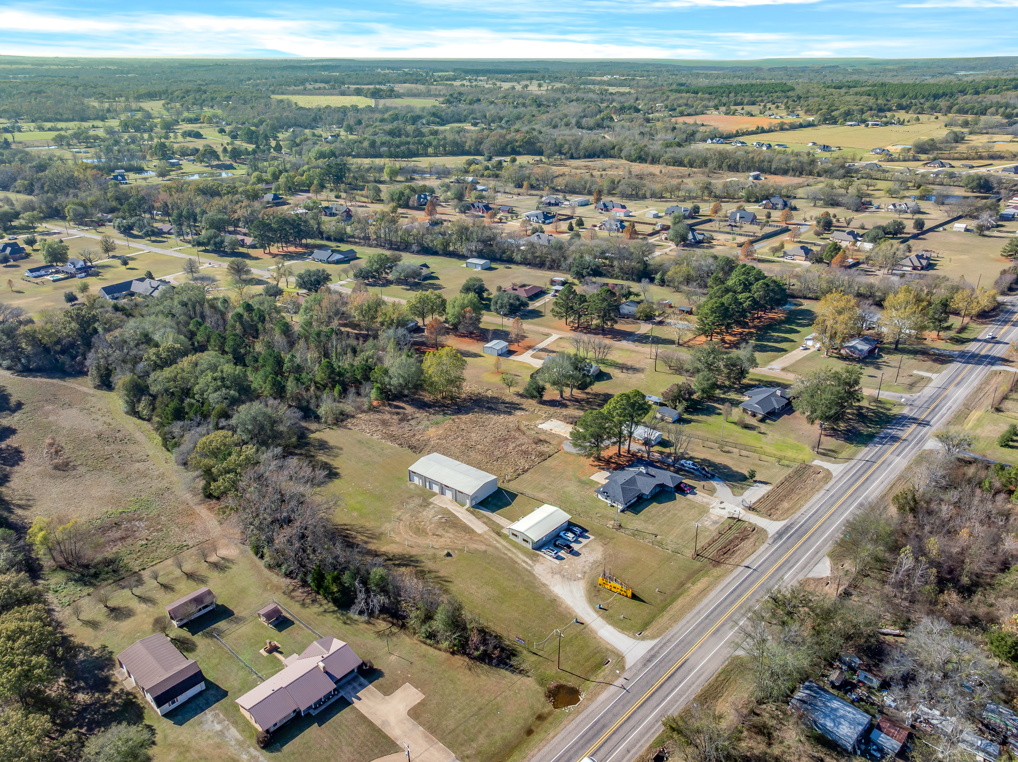For Sale: 6 Acres + Retail Storefront + Flex Warehouse with Two Apartments 3