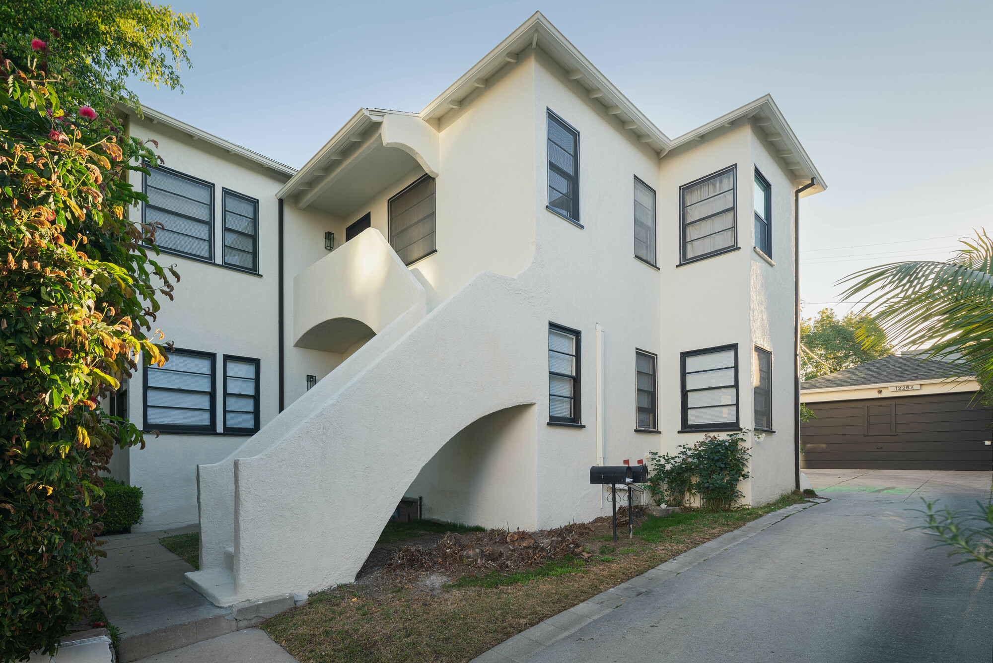 3-unit multifamily property at 1228 S Dunsmuir Ave, Los Angeles, CA