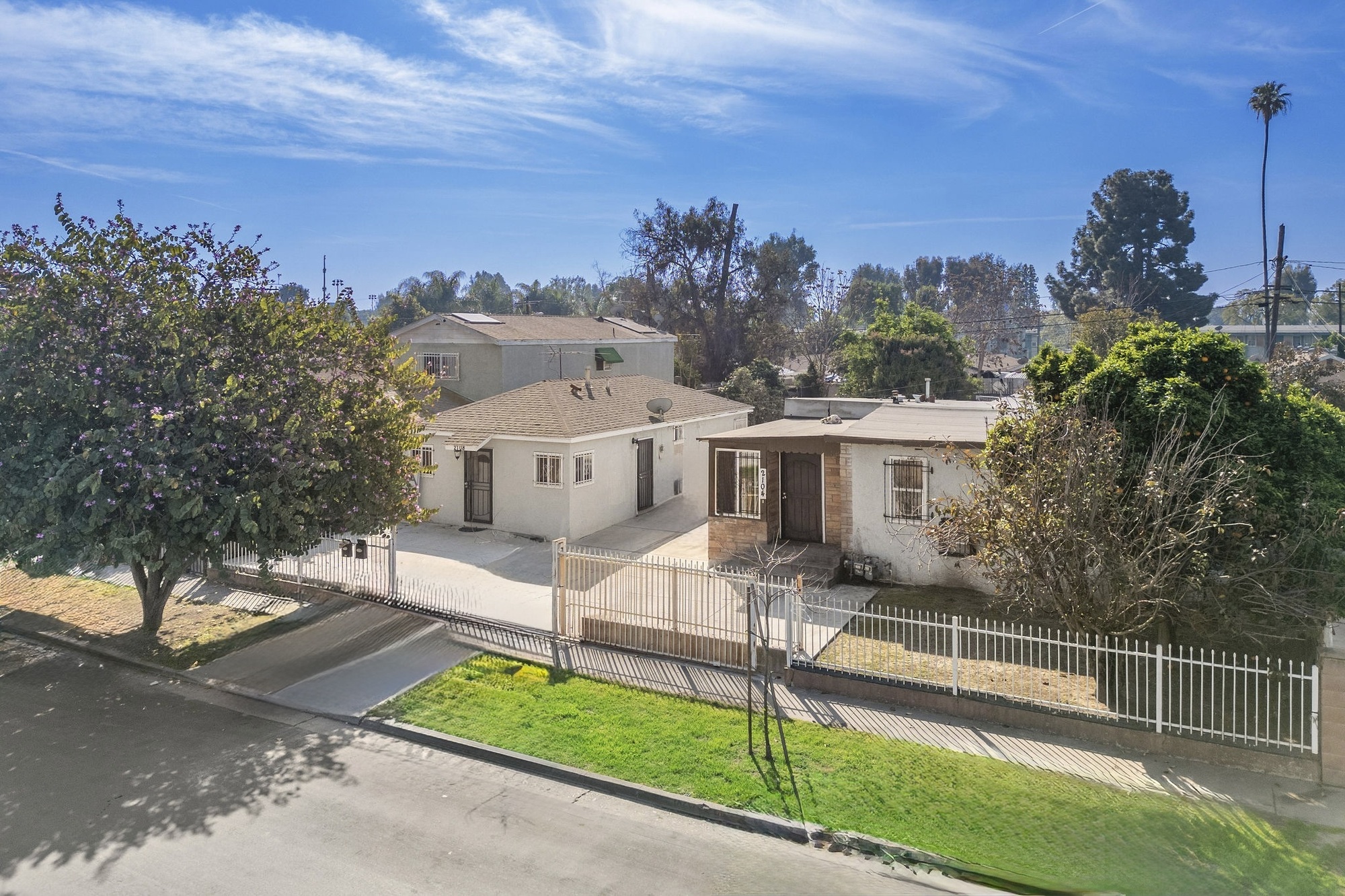 3-unit multifamily property at 2104 E 113th St, Los Angeles, CA
