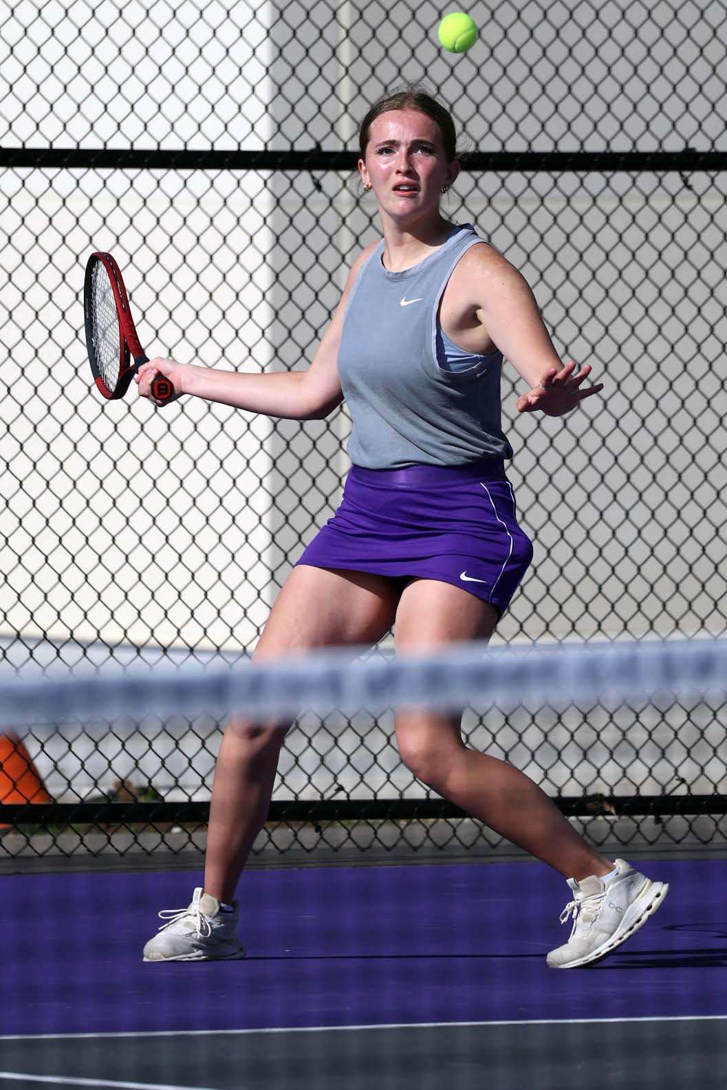 Burlington High School's Anna Buxton returns the ball during her singles match against Keokuk High School's Neveah Logan on April 21 at Burlington's tennis courts. Photo/John Lovretta&nbsp;
