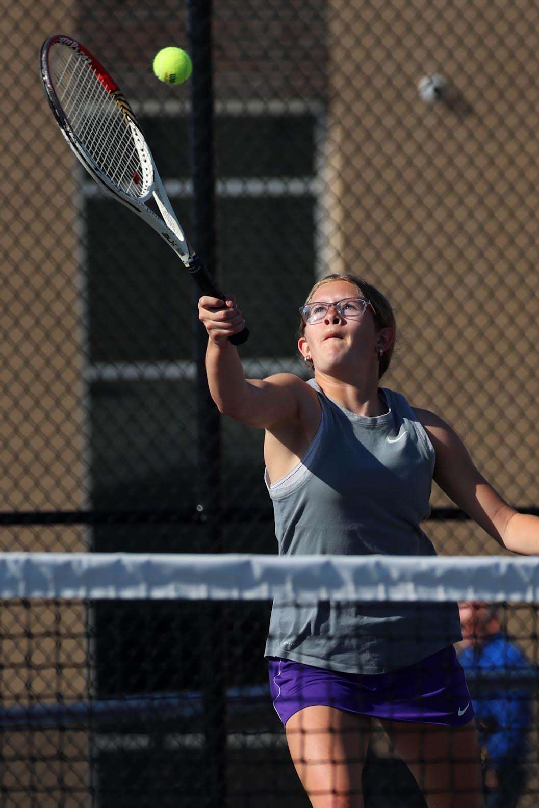 Burlington High School's Josie Newell returns the ball during her singles match against Keokuk High School's Aubrey Dade on April 21 at Burlington's tennis courts. Photo/John Lovretta&nbsp;