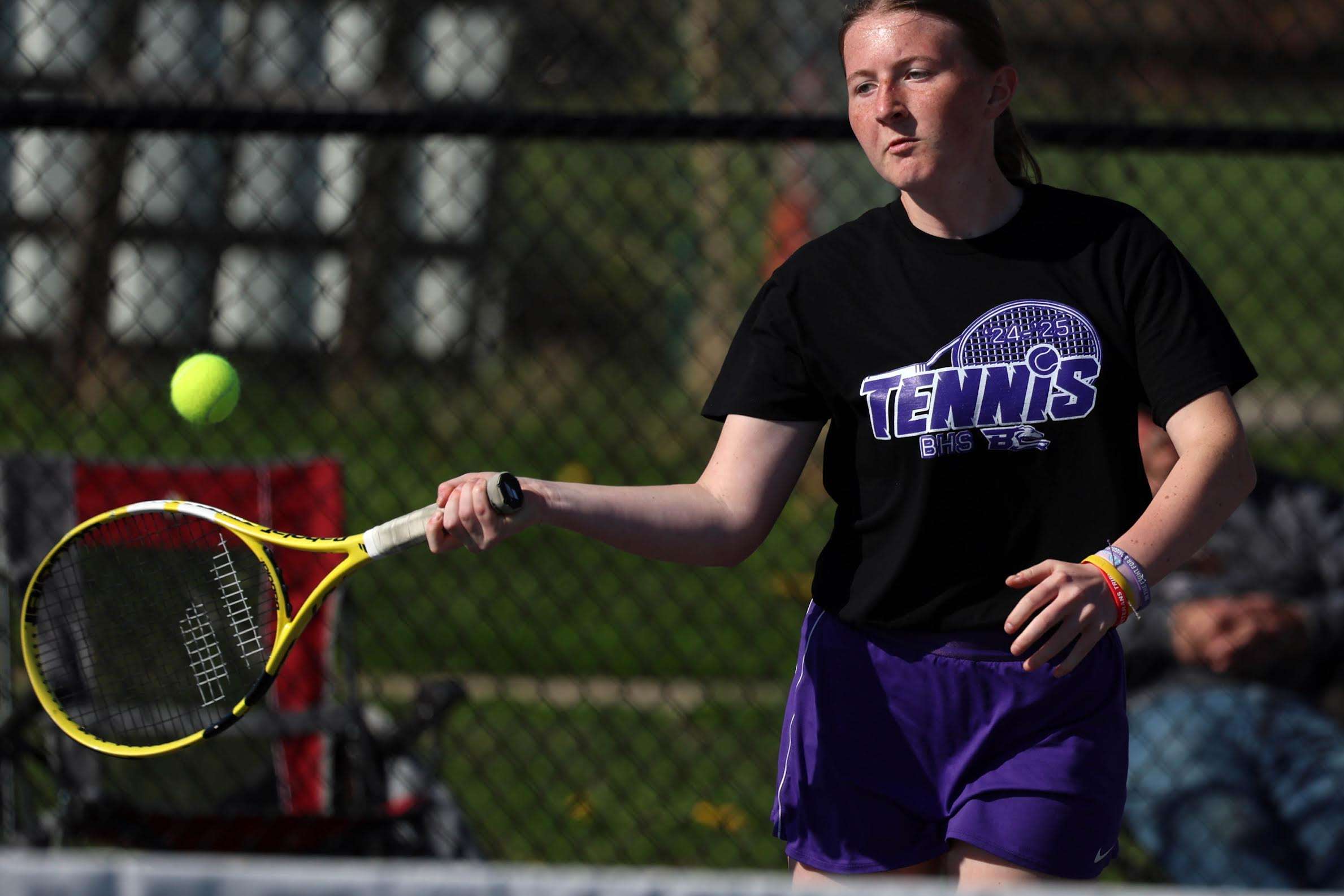 Burlington High School's Ava Moffett (2) returns the ball during her singles match against Keokuk High School's Sophia Rule, on April 21 at Burlington's tennis courts. Photo/John Lovretta