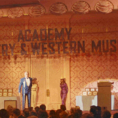 Bonanzas Lorne Greene handled hosting duties for the 2nd Academy of Country and Western Music Awards on March 7, 1967 at the Beverly Hills Hotel. The first shows were a mix of country-and-western singers and Hollywood stars. 