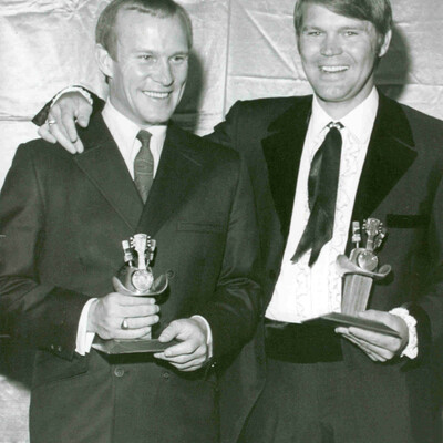 [Tom Smothers and Glen Campbell at the ACM Awards in 1968] In 1968, the Academy introduced the first signature hat trophy.  