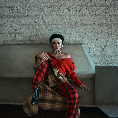 Agnez Mo In A Red An Black Oufit On A Couch  B00A6757.jpg