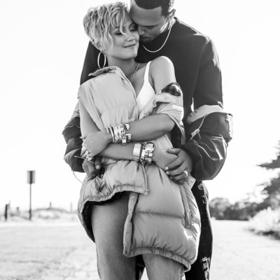 Agnez Mo and Chris Brown Cuddling  Agnez Mo and Chris Brown in designer clothes photo shoot